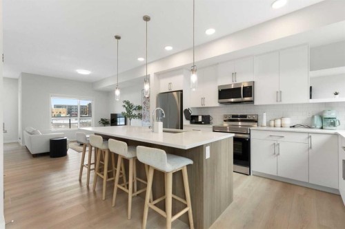 608-20295 Seton Way Se, Calgary, AB - Indoor Photo Showing Kitchen With Stainless Steel Kitchen With Upgraded Kitchen