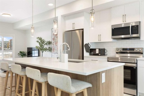 608-20295 Seton Way Se, Calgary, AB - Indoor Photo Showing Kitchen With Stainless Steel Kitchen With Upgraded Kitchen