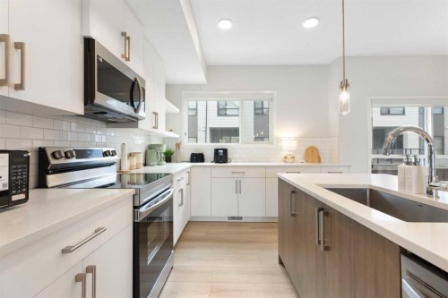 608-20295 Seton Way Se, Calgary, AB - Indoor Photo Showing Kitchen With Upgraded Kitchen