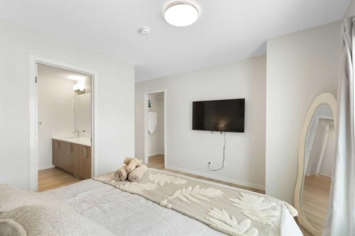608-20295 Seton Way Se, Calgary, AB - Indoor Photo Showing Bedroom