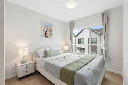 608-20295 Seton Way Se, Calgary, AB - Indoor Photo Showing Bedroom