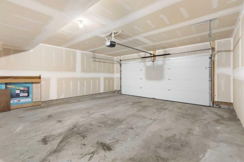 608-20295 Seton Way Se, Calgary, AB - Indoor Photo Showing Garage