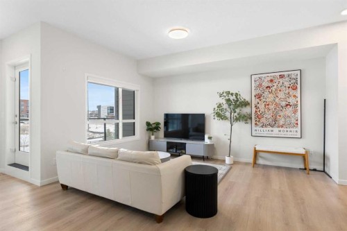 608-20295 Seton Way Se, Calgary, AB - Indoor Photo Showing Living Room