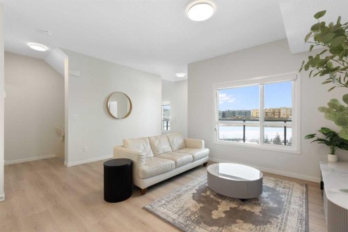 608-20295 Seton Way Se, Calgary, AB - Indoor Photo Showing Living Room