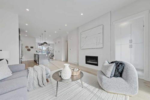 523 55 Avenue Sw, Calgary, AB - Indoor Photo Showing Living Room With Fireplace