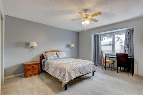 38 Millbank Hill Sw, Calgary, AB - Indoor Photo Showing Bedroom