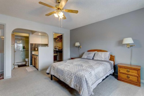 38 Millbank Hill Sw, Calgary, AB - Indoor Photo Showing Bedroom