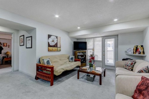 38 Millbank Hill Sw, Calgary, AB - Indoor Photo Showing Living Room
