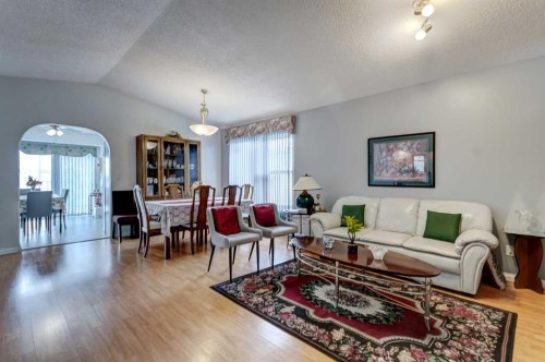 38 Millbank Hill Sw, Calgary, AB - Indoor Photo Showing Living Room