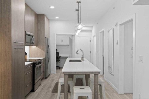 2408-76 Cornerstone Passage Ne, Calgary, AB - Indoor Photo Showing Kitchen With Double Sink With Upgraded Kitchen