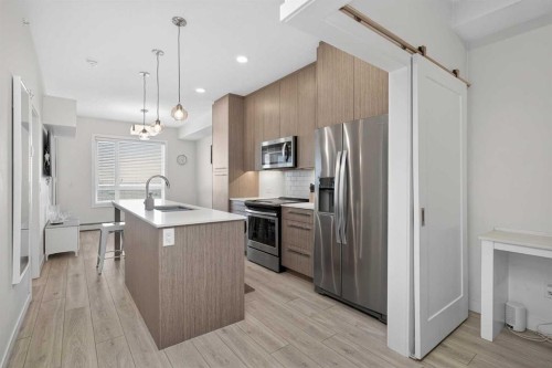 2408-76 Cornerstone Passage Ne, Calgary, AB - Indoor Photo Showing Kitchen With Stainless Steel Kitchen With Upgraded Kitchen