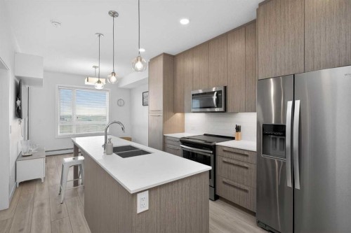 2408-76 Cornerstone Passage Ne, Calgary, AB - Indoor Photo Showing Kitchen With Stainless Steel Kitchen With Upgraded Kitchen