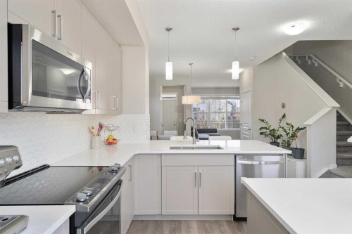 849 Mahogany Boulevard Se, Calgary, AB - Indoor Photo Showing Kitchen With Upgraded Kitchen
