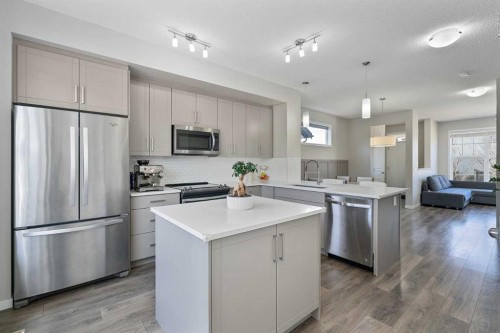 849 Mahogany Boulevard Se, Calgary, AB - Indoor Photo Showing Kitchen With Upgraded Kitchen