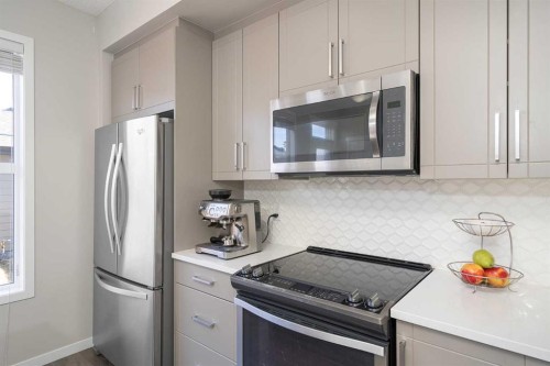 849 Mahogany Boulevard Se, Calgary, AB - Indoor Photo Showing Kitchen With Upgraded Kitchen