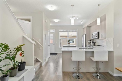849 Mahogany Boulevard Se, Calgary, AB - Indoor Photo Showing Kitchen With Upgraded Kitchen