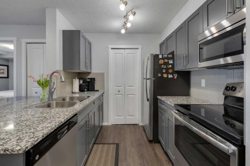 2214-81 Legacy Boulevard Se, Calgary, AB - Indoor Photo Showing Kitchen With Double Sink With Upgraded Kitchen