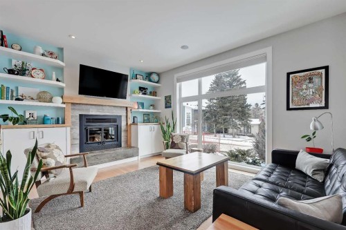 4512 21 Avenue Nw, Calgary, AB - Indoor Photo Showing Living Room With Fireplace