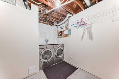 27 Gladeview Crescent Sw, Calgary, AB - Indoor Photo Showing Laundry Room