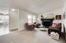 88 Sunhurst Road Se, Calgary, AB  - Indoor Photo Showing Living Room With Fireplace 