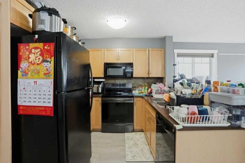 5106-70 Panamount Drive Nw, Calgary, AB - Indoor Photo Showing Kitchen