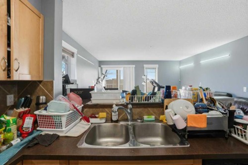 5106-70 Panamount Drive Nw, Calgary, AB - Indoor Photo Showing Kitchen With Double Sink