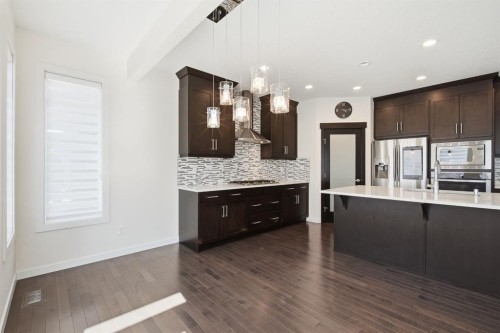 101 Evansborough Green Nw, Calgary, AB - Indoor Photo Showing Kitchen With Upgraded Kitchen