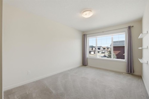 101 Evansborough Green Nw, Calgary, AB - Indoor Photo Showing Other Room