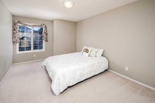 143 Hamptons Terrace Nw, Calgary, AB - Indoor Photo Showing Bedroom