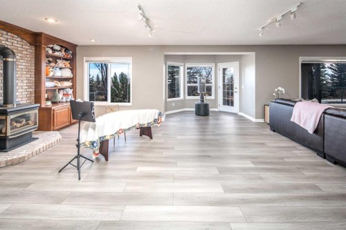 143 Hamptons Terrace Nw, Calgary, AB - Indoor With Fireplace