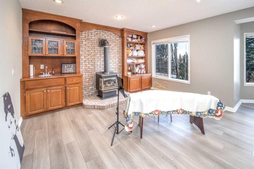 143 Hamptons Terrace Nw, Calgary, AB - Indoor With Fireplace