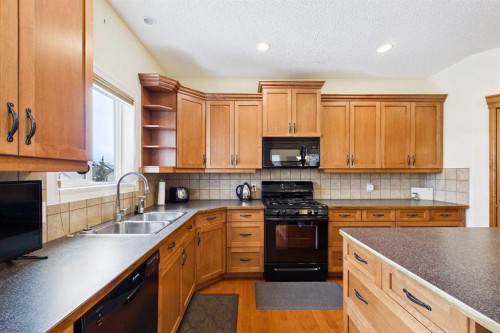 167 Evanston View Nw, Calgary, AB - Indoor Photo Showing Kitchen With Double Sink