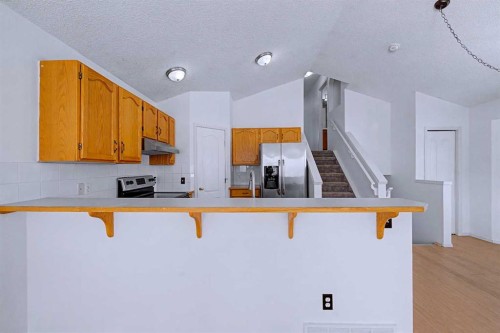 152 Saddlecreek Terrace Ne, Calgary, AB - Indoor Photo Showing Kitchen