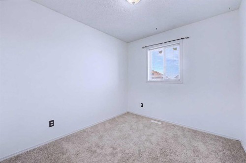 152 Saddlecreek Terrace Ne, Calgary, AB - Indoor Photo Showing Other Room