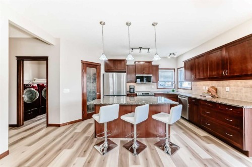 148 Hawkmere Way, Chestermere, AB - Indoor Photo Showing Kitchen With Upgraded Kitchen
