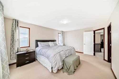 148 Hawkmere Way, Chestermere, AB - Indoor Photo Showing Bedroom