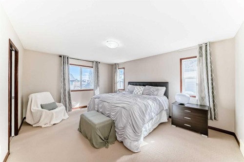 148 Hawkmere Way, Chestermere, AB - Indoor Photo Showing Bedroom