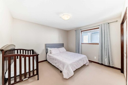 148 Hawkmere Way, Chestermere, AB - Indoor Photo Showing Bedroom