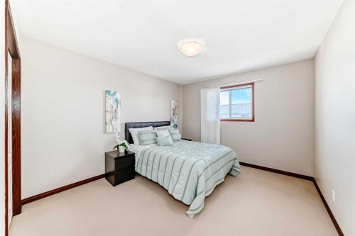 148 Hawkmere Way, Chestermere, AB - Indoor Photo Showing Bedroom