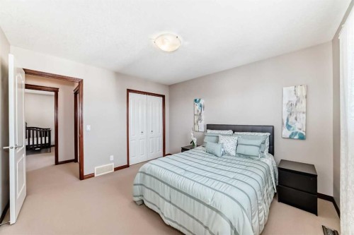 148 Hawkmere Way, Chestermere, AB - Indoor Photo Showing Bedroom