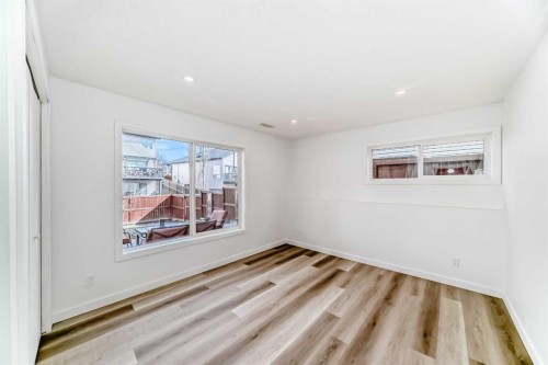 148 Hawkmere Way, Chestermere, AB - Indoor Photo Showing Other Room