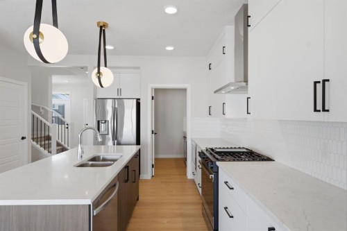84 Lewiston View Ne, Calgary, AB - Indoor Photo Showing Kitchen With Double Sink With Upgraded Kitchen