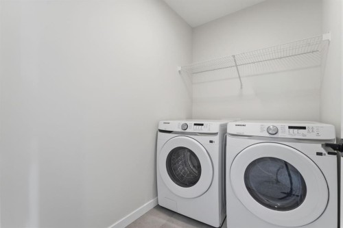 84 Lewiston View Ne, Calgary, AB - Indoor Photo Showing Laundry Room
