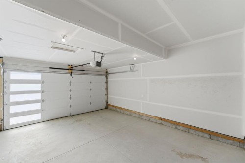 84 Lewiston View Ne, Calgary, AB - Indoor Photo Showing Garage