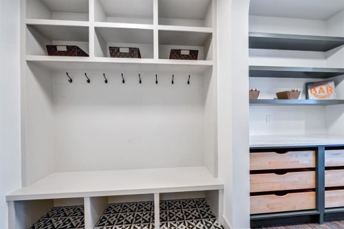 128 Sunrise Heath, Cochrane, AB - Indoor With Storage