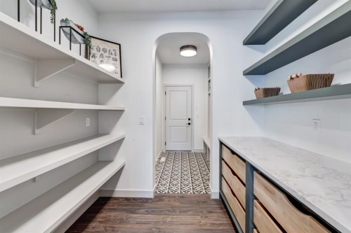 128 Sunrise Heath, Cochrane, AB - Indoor With Storage