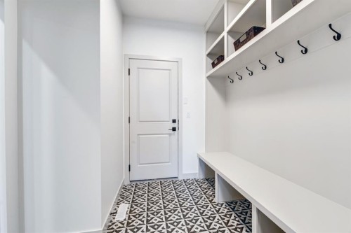 128 Sunrise Heath, Cochrane, AB - Indoor Photo Showing Other Room