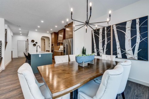 128 Sunrise Heath, Cochrane, AB - Indoor Photo Showing Dining Room