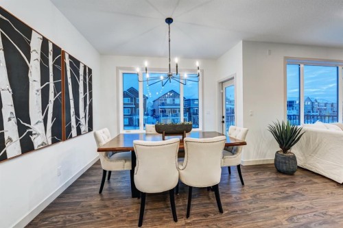 128 Sunrise Heath, Cochrane, AB - Indoor Photo Showing Dining Room