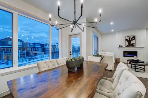 128 Sunrise Heath, Cochrane, AB - Indoor With Fireplace